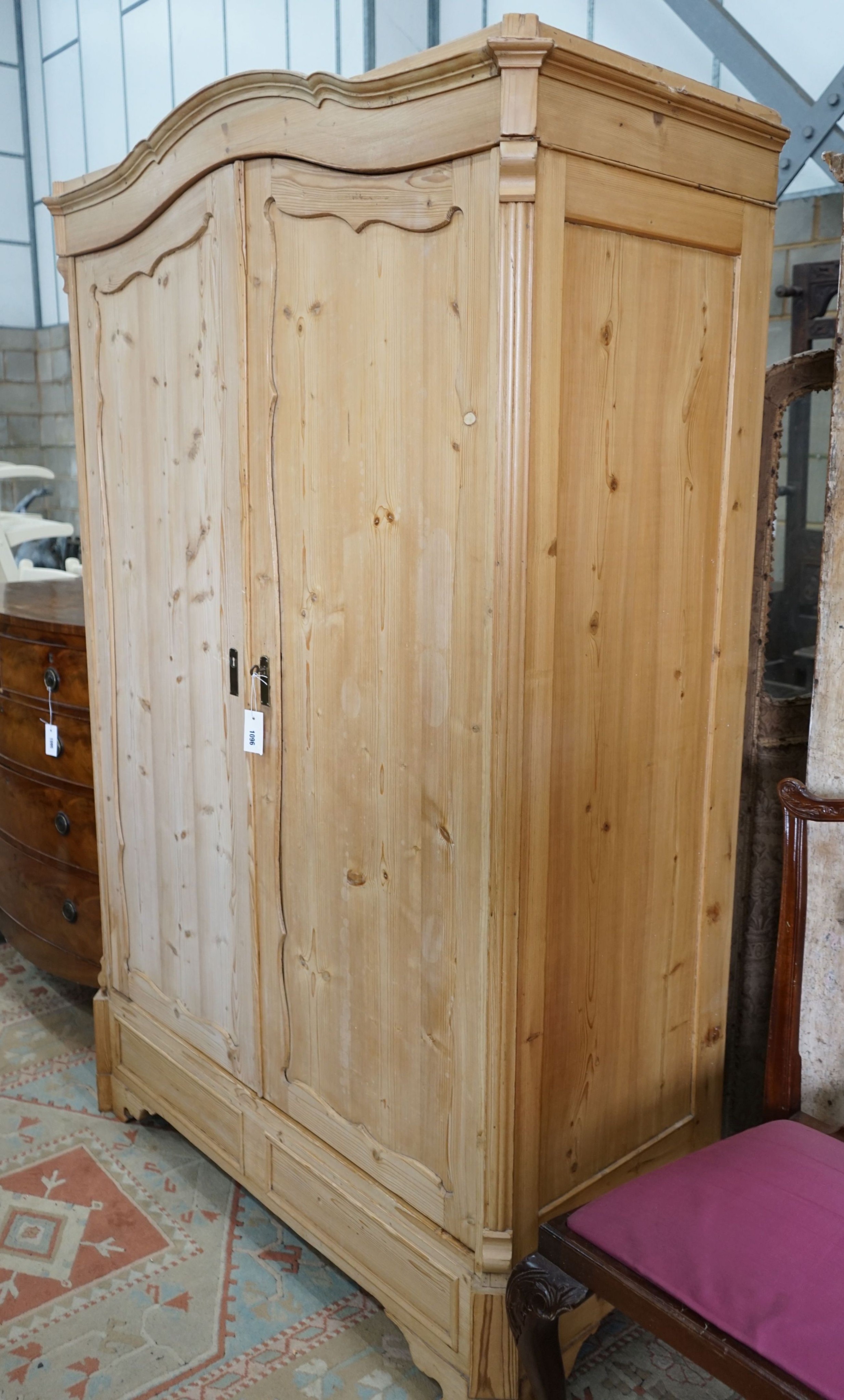 A 19th century East European 'knockdown' pine wardrobe, length 130cm, depth 58cm, height 198cm